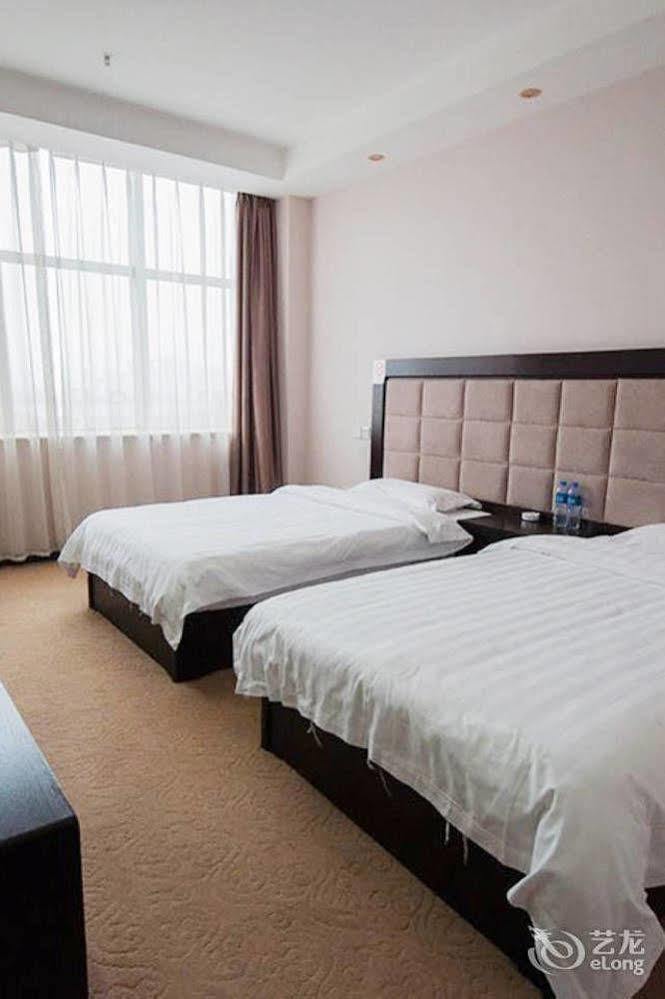 Splendid Oriental Business Hotel Tianjin Bagian luar foto